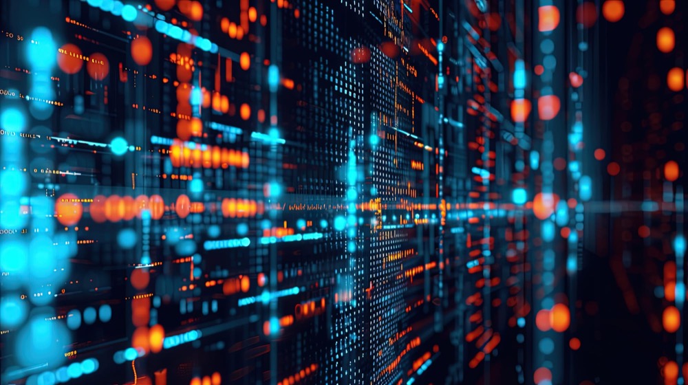 An abstract grid of glowing orange and blue data points receding into the distance
